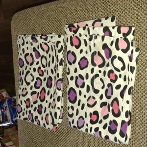 2 Pillowcases with colored leperd print patterns